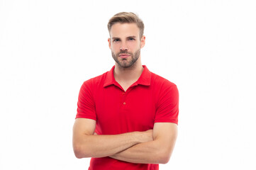 confident stubble man wearing red shirt. studio shot of man with stubble. young man