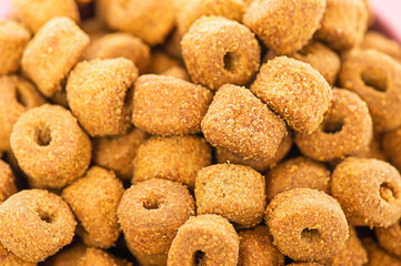 Macro photo of dry food for pets. Balanced nutrition for animals.