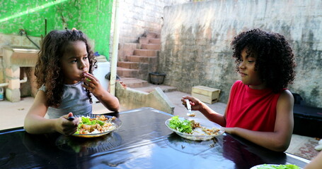 Brazilian kids eating lunch. Hispanic children lunch time4