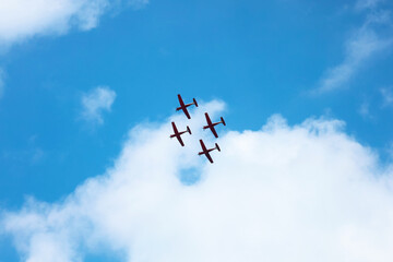 Modern airplanes flying in blue sky