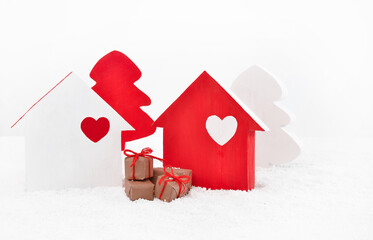Wooden houses and Christmas trees of red and white color, exchange of gifts between friends. Family...