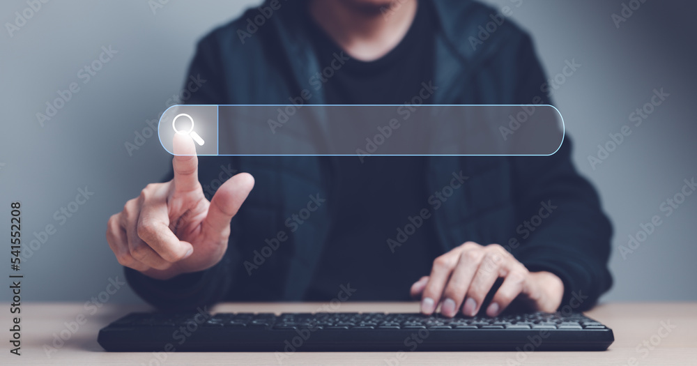 Poster man finger showing a search bar virtual and hand on computer keyboard to searching for information. 