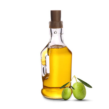 Bottiglia di olio di oliva e olive verdi