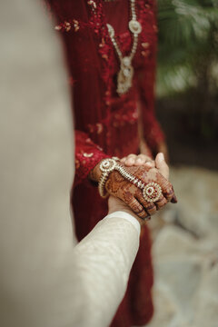 Indian Wedding Couples Holding Hands