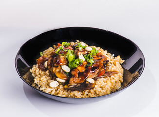 Cajun chicken with rice, full of flavor and hot spices with fresh vegetable bio peas