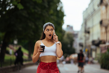 Beautiful fashion woman talking to the phone