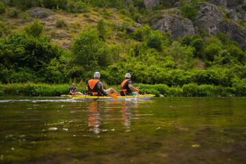 Fototapeta na wymiar Kayaking together in pairs