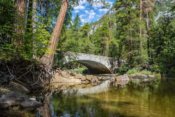 The iconic Pohono Bridge on a summer morning in Yosemite Valley, California, USA