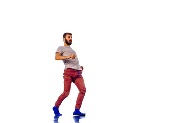 Fototapeta na wymiar Modern boy standing isolated on white background