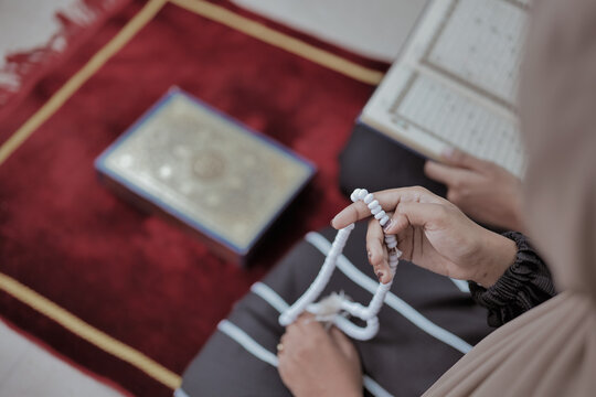 Muslim Women Reciting Quran at Home
