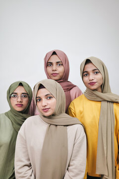 Group of Young Muslim Women Wearing Hijabs at Home