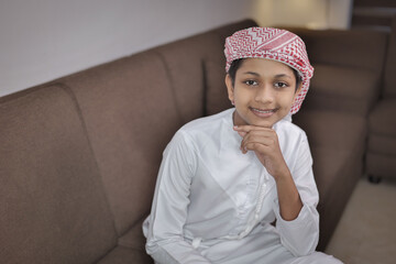 Young Indian Muslim Boy Smiling Wearing Arabic Clothes
