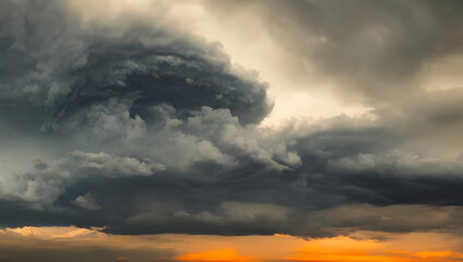 a supercell storm / thunderstorm with dark clouds far away in the distance on an open farming field