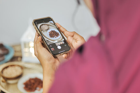 Muslim Women Taking a Photo on Phone