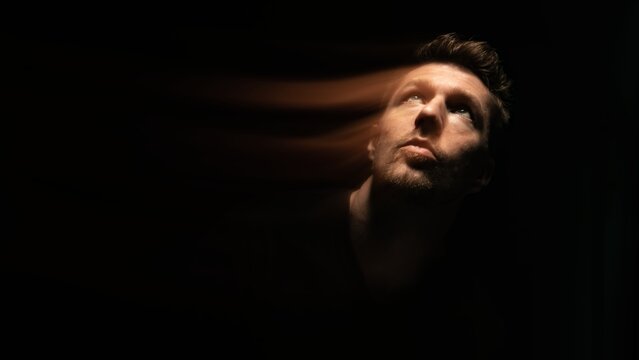 Double exposure on man projecting inner thoughts