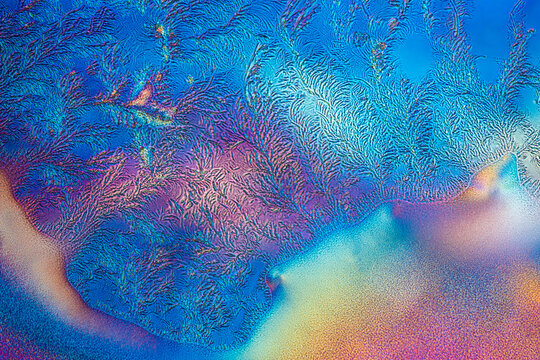 Picture of the crystals of the chemical substance Ascorbicacid, vitamin C, made by a microscope in polarized light