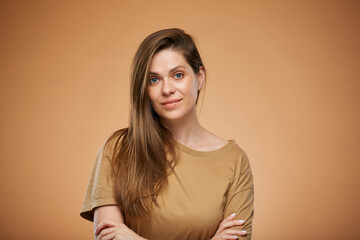 Obraz premium Smiling woman with long hair in brown home male shirt. Isolated female portrait.