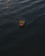 A man is rowing a boat