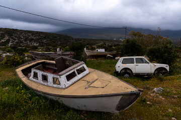 old boat abandonned on the field