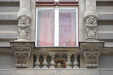 Close-up ornate window of old building in Prague, Czech Republic.