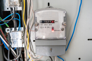 Electric meter with a lot of wires. Residential. Repair. Bills