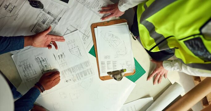 Plan, blueprint and architecture, construction and meeting, architect and construction worker with design, paper and team. Collaboration, engineer planning and clipboard in construction site overhead