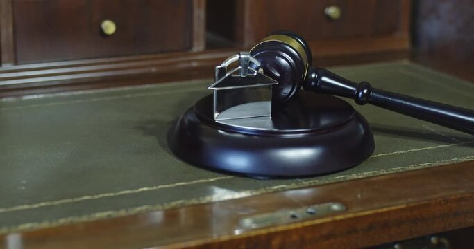 4K: Gavel Law for smash table of judges. It represents justice. Property auction on real estate. There are experts who help to make decisions that are worth the investment. Concept Auction House.