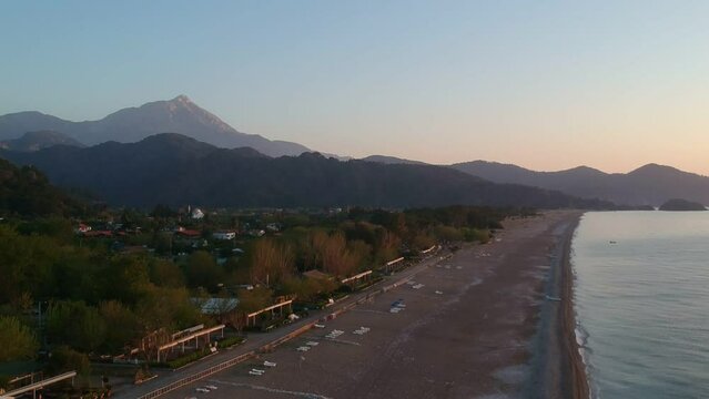 View from above to Cirali beach and Olimpos mountain in a sunset light. Kemer, Antalya, Mediterranean region, Turkey, Lycia.