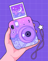 Cute kawaii instant camera. Small mirrorless retro camera. Hand holding mini camera with a photo. Cartoon girly pastel background. Evening sky, Moon, stars, clouds. 