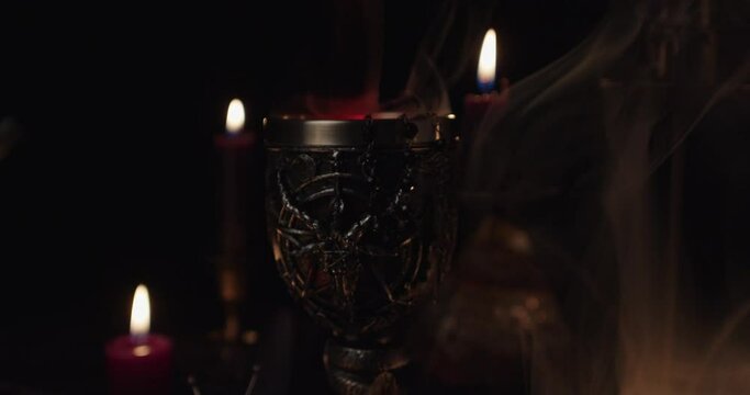 Altar for satanic rituals on a black background.
