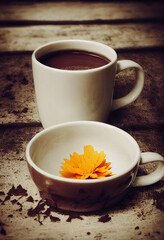Champurrado. Chocolate. Traditional Mexican Chocolat. Cup of hot chocolate. Bebida tradicional mexicana Champurrado. Day of the dead celebration and lots of marigolds