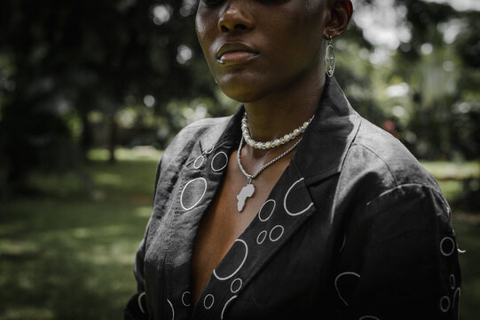 closeup of necklaces worn by a black woman