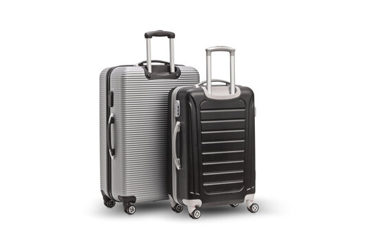 Big silver and smaller black hard side suitcases