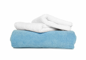 Folded soft terry towels on white background