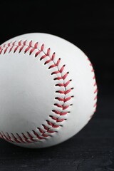 Baseball ball on black background, closeup. Sports game