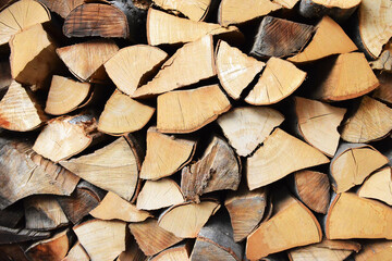 Pile of chopped firewood logs