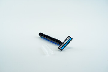 Black two blade disposable razor isolated on white background
