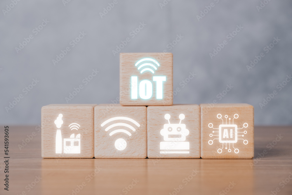 Poster iot internet of things, wooden cube block with internet of things icon with copy space, digital tran