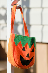 Halloween bag hanging in the backyard