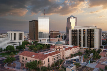 Beautiful colorful sunset over downtown Tucson, Arizona. Old Pima County courthouse in foreground - obrazy, fototapety, plakaty