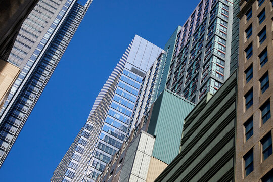 Tall building image with a bright blue sky
