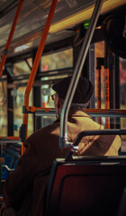 Obraz na płótnie Canvas oldman sitting on the bus