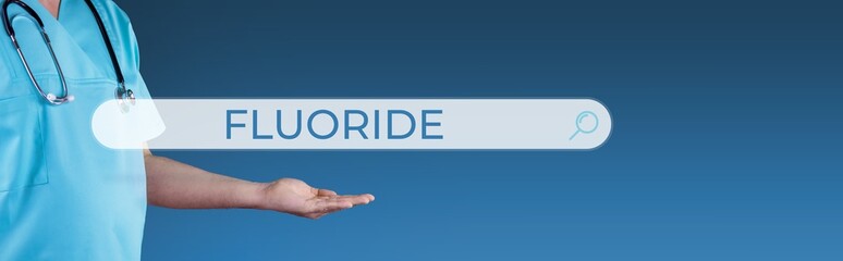 Fluoride. Doctor stretches out hand. Browser search with text hovers over it. Medicine online on...