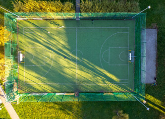 Basketball and soccer field seen from above, sports facility. Drone photo, bird's eye view photo.