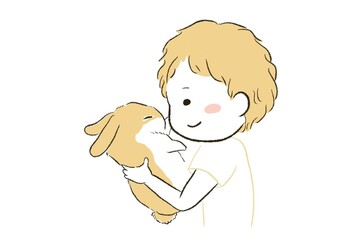 ペットのうさぎを抱っこする子ども(男の子)