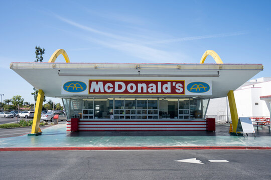 Downey, CA, USA - May 10, 2022: Front view of the oldest remaining McDonald's in Downey, California, outside of Los Angeles. This location opened in 1953, and was the fourth McDonald's ever built.