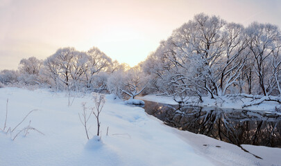 Winter landscape with forest river