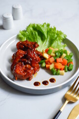 meat with vegetables and sauce