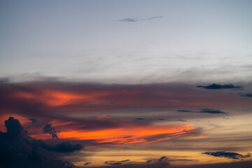 The dramatic colors of the sunset in the sky gradient from blue to orange.