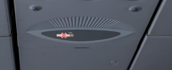 Do not smoke. Symbol of not smoking on the plane. Display symbol  do not smoke in the airplane